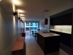 cenf rénovation appartement paris 08 55 m2 après travaux cuisine salle à manger cuisine américaine îlot 1
